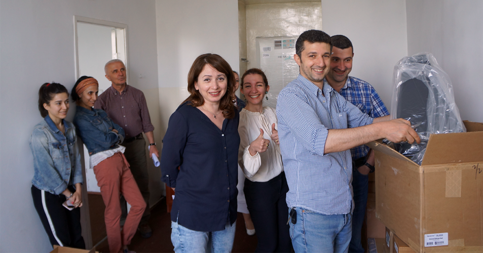 Dr. Arsen Arakelyan and colleagues unpack the IMB's shipment of Instrumental Access equipment in June 2018.