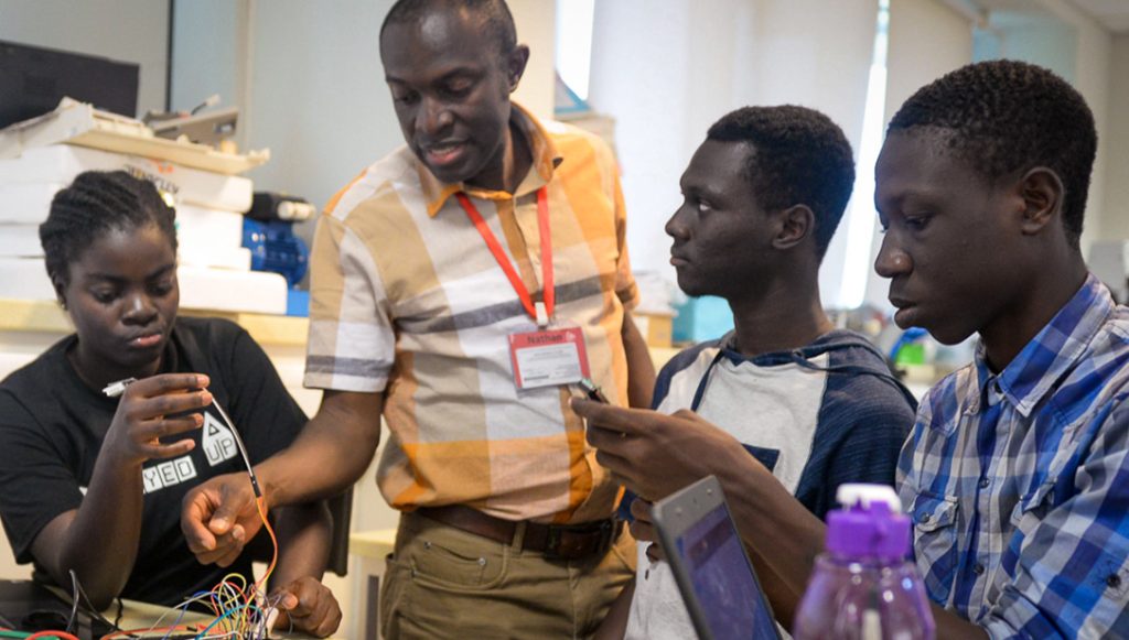 Students doing an experiment at Ashesi University