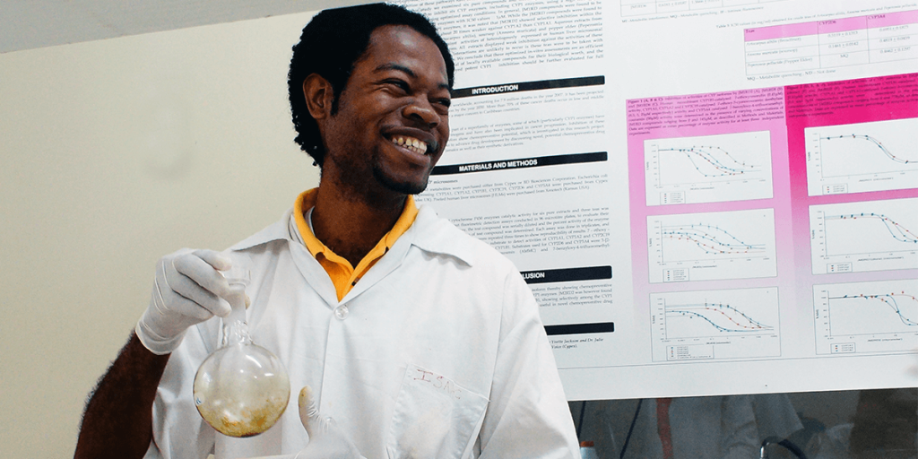 Graduate student Issac Morrison successfully distills a plant extract