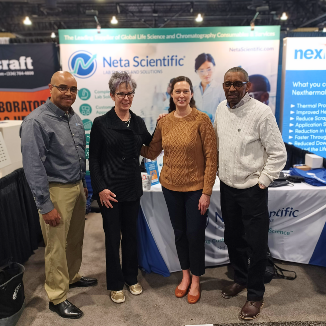 Seeding Labs Director or Corporate Relations, Jennifer Raymond, with employees from Neta Scientific, a Seeding Labs supporter.